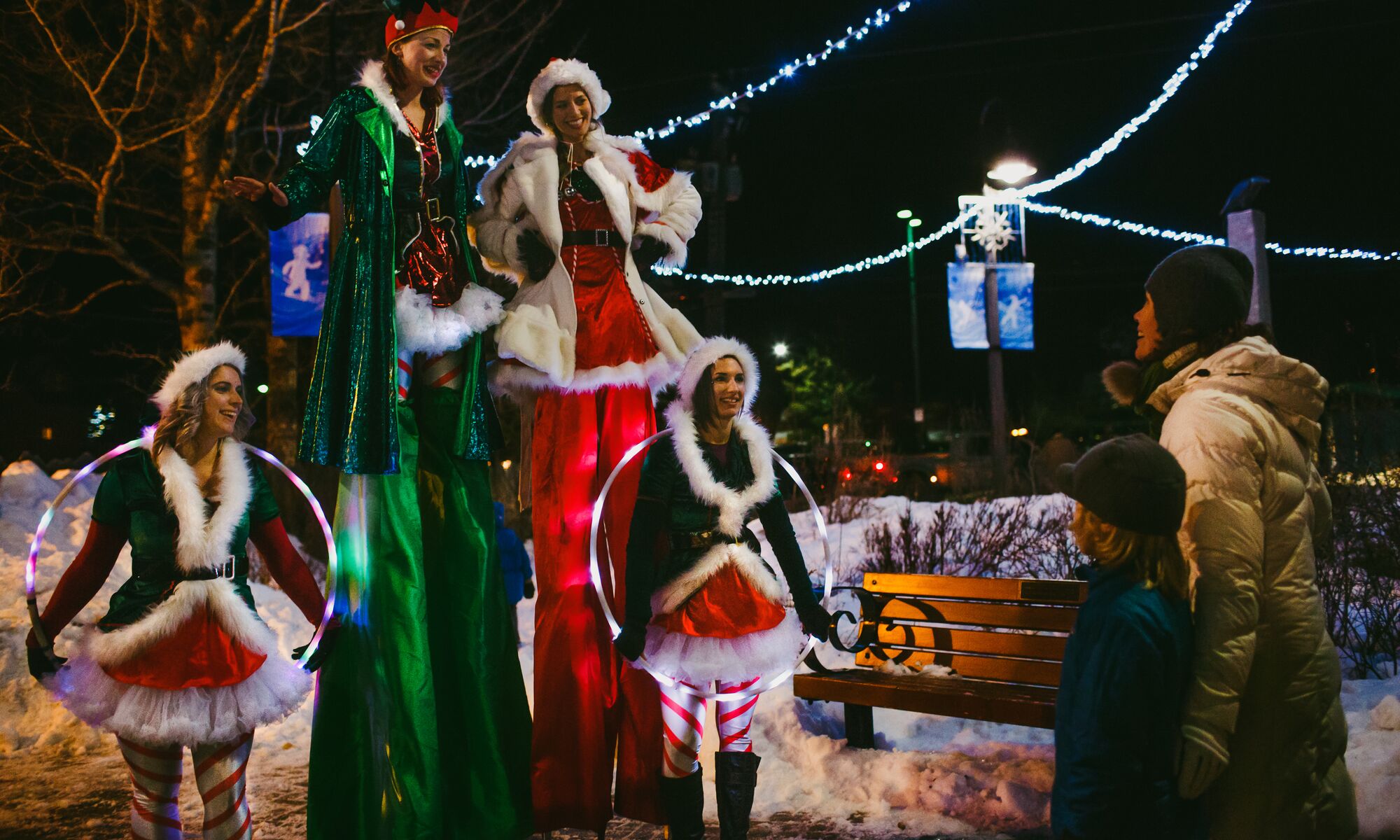 Performers on Banff Ave during the Santa Claus Celebration of Lights in Banff NAtional Park.